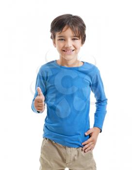Cute little boy showing thumb-up gesture on white background�