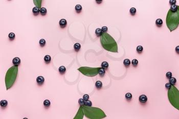 Fresh acai berries on color background�