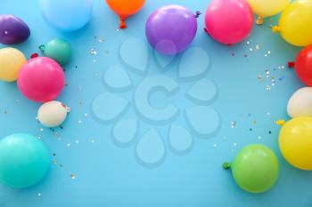 Many balloons on color background�