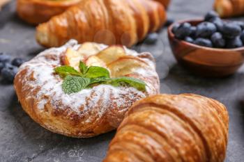 Sweet pastry on grey background, closeup�