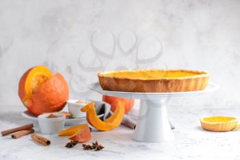 Tasty pumpkin pie on table�