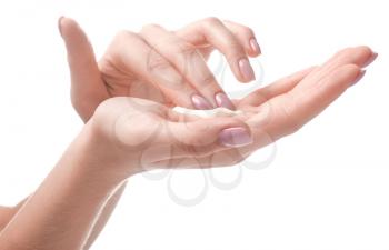 Female hands with cream on white background�