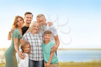Portrait of big family in park�