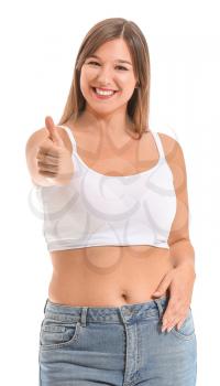 Young body positive woman showing thumb-up on white background�