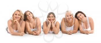 Group of body positive women on white background�