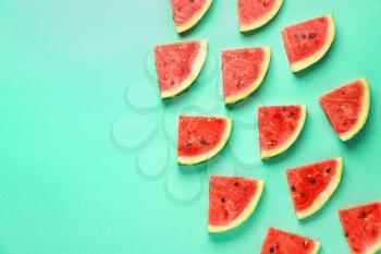 Many slices of watermelon on color background�