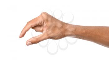Male hand holding something on white background�