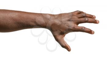 Hand of African-American man holding something on white background�