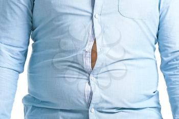 Overweight man in tight clothes, closeup. Weight loss concept�