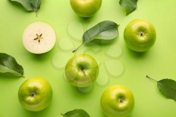 Fresh ripe apples on color background�