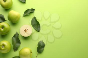 Fresh ripe apples on color background�