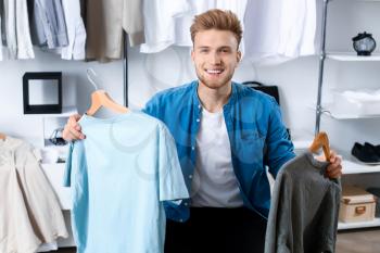Handsome man with stylish clothes in dressing room�