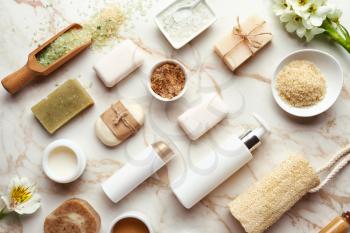 Composition with spa items and cosmetics on light background�