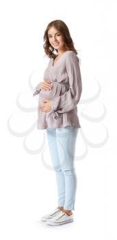 Young pregnant woman on white background�