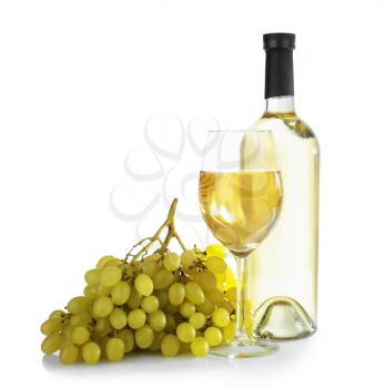Glass and bottle of tasty wine on white background�
