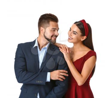 Portrait of beautiful young couple on white background�