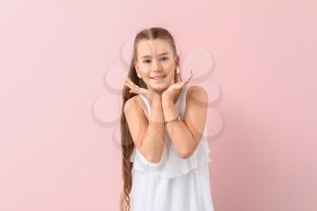 Cute fashionable girl on color background�