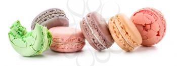 Different tasty macarons on white background�