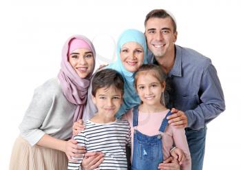 Portrait of Muslim family on white background�