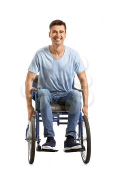 Handicapped young man in wheelchair on white background�