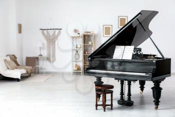Interior of room with stylish grand piano�