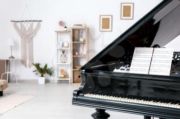 Interior of room with stylish grand piano�