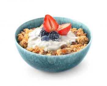 Tasty granola with yogurt in bowl on white background�