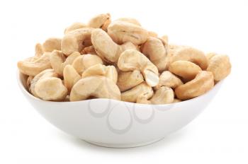 Bowl with cashew nuts on white background�