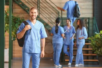 Group of medical students in corridor of modern clinic�