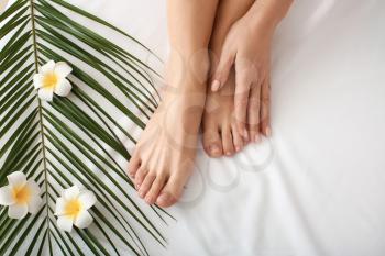 Legs of beautiful woman relaxing in spa salon�