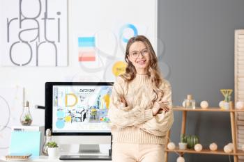 Portrait of female interior designer in office�