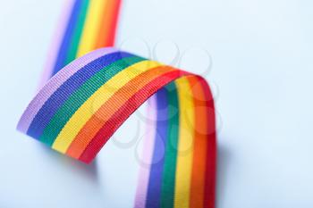Rainbow ribbon of LGBT on color background�