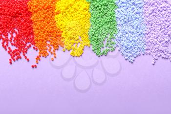 Many beads on color background. LGBT concept�