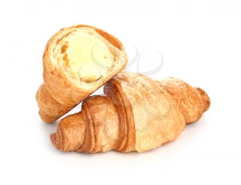 Tasty sweet croissants on white background�