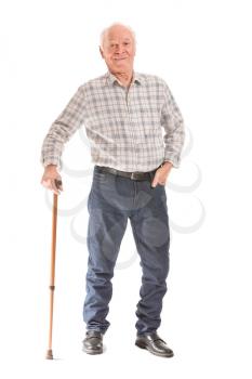 Portrait of elderly man with walking stick on white background�