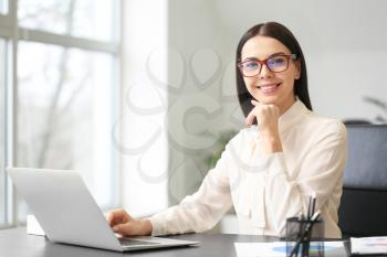 Female accountant working in office�