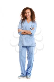 Young African-American nurse on white background�