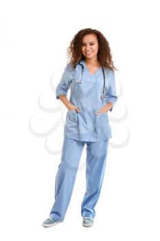 Young African-American nurse on white background�