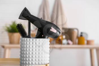 Modern blow dryer and hairdresser tools in salon�