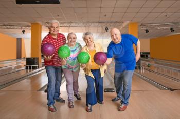 Portrait of senior people in bowling club�