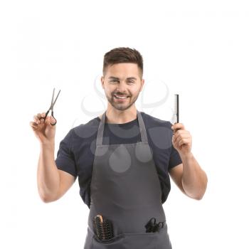 Portrait of male hairdresser on white background�