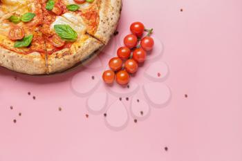 Delicious pizza Margherita on color background�