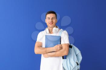 Portrait of male student on color background�