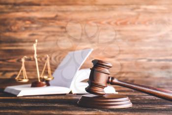 Judge's gavel on wooden background�