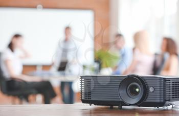Video projector on table in conference hall�