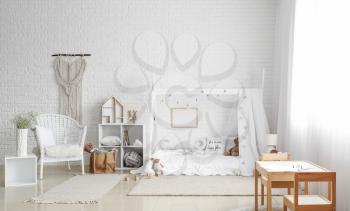 Interior of modern children's room with comfortable bed�
