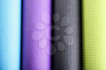 Different colorful yoga mats�