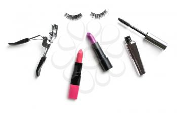 Flat lay composition with decorative cosmetics on white background�