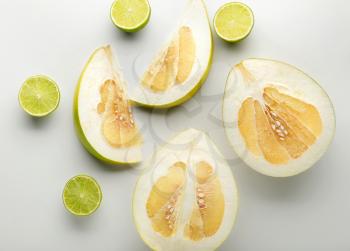 Summer composition with tropical fruits on white background�