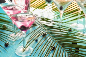 Glasses with delicious summer cocktail on table�